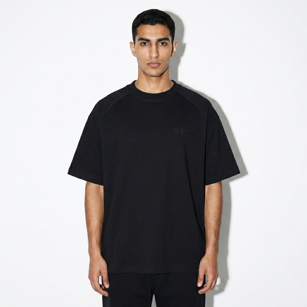 Raglan Sleeve T-Shirt worn by a lean Arab male fashion influencer, editorial avant-garde styling, studio lookbook — custom raglan sleeve t-shirt