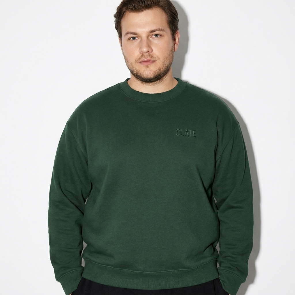 Relaxed Crewneck Sweatshirt worn by a curvy German male fashion influencer, editorial avant-garde styling, studio lookbook — custom relaxed crewneck sweatshirt