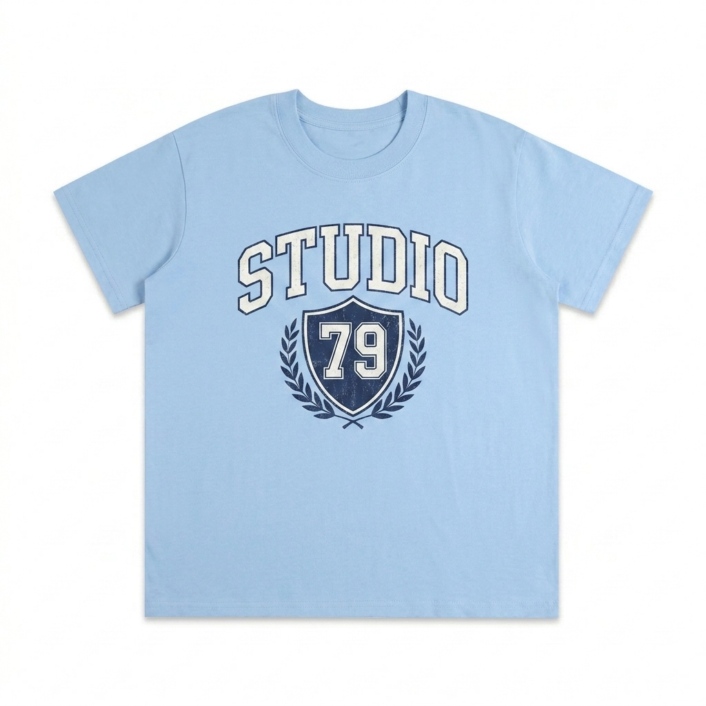 Custom Relaxed Fit Seamless T-Shirt design direction 3: Retro Collegiate Emblem featuring the STUDIO 79 wordmark