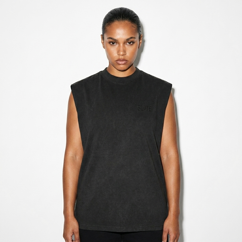 Reverse Washed Tank Top worn by a broad-shouldered Mixed-race female fashion influencer, gorpcore outdoor styling, studio lookbook — custom reverse washed tank top