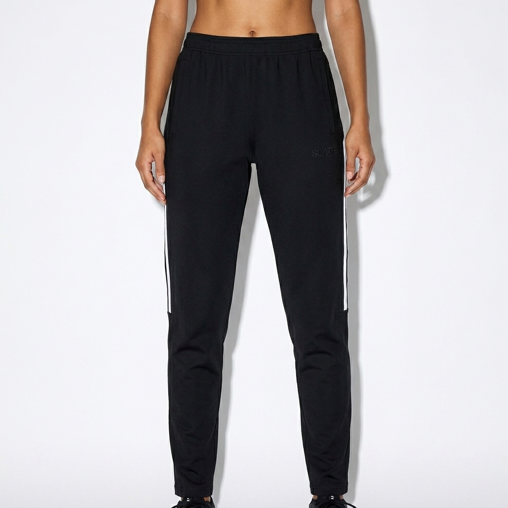 Side Stripe Running Pants worn by a lean Latino female fashion influencer, techwear modern styling, studio lookbook — custom side stripe running pants