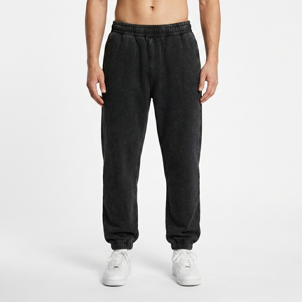 Snow Wash Heavyweight Jogger Sweatpants worn by a petite German male fashion influencer, sporty athleisure styling, studio lookbook — custom snow wash heavyweight jogger sweatpants