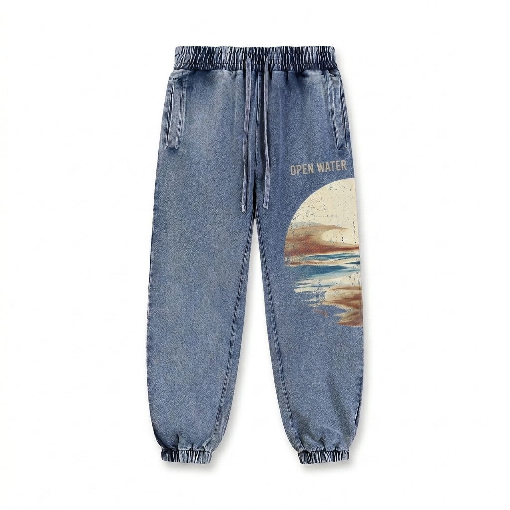 Custom Snow Wash Jogger Sweatpants design direction 2: Abstract Horizon featuring the OPEN WATER wordmark