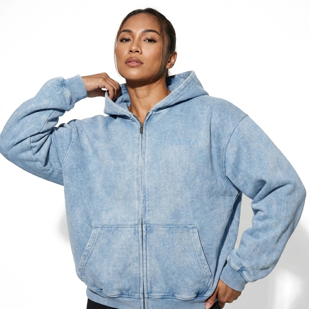 Snow Wash Oversized Zip-Up Hoodie worn by a athletic muscular Filipino female fashion influencer, gorpcore outdoor styling, studio lookbook — custom snow wash oversized zip-up hoodie