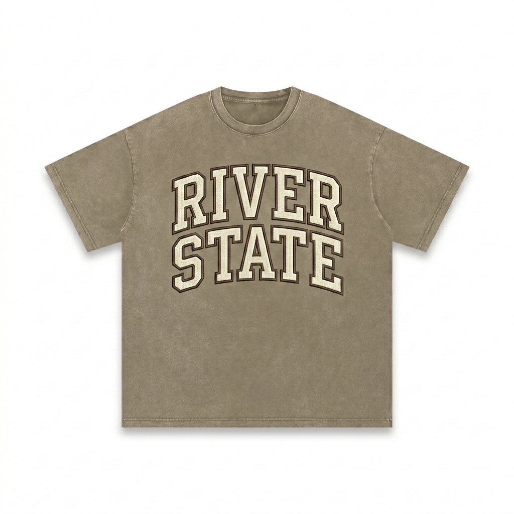 Custom Snow Washed Oversized T-Shirt design direction 3: Retro Collegiate Emblem featuring the RIVER STATE wordmark