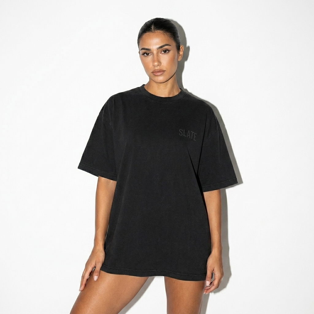Snow Washed Oversized T-Shirt worn by a toned Mediterranean female fashion influencer, y2k revival styling, studio lookbook — custom snow washed oversized t-shirt