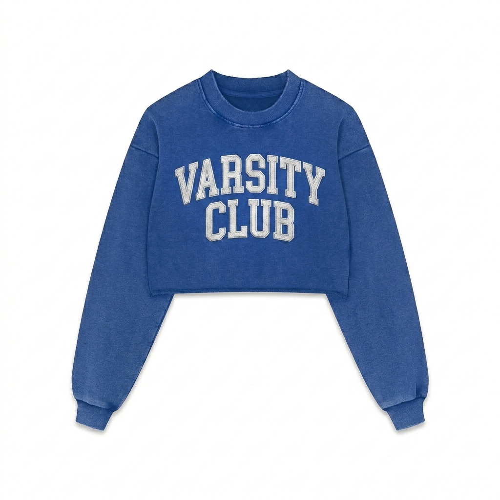 Custom Snow Washed Raw Edge Cropped Sweatshirt design direction 3: Retro Collegiate Emblem featuring the VARSITY CLUB wordmark