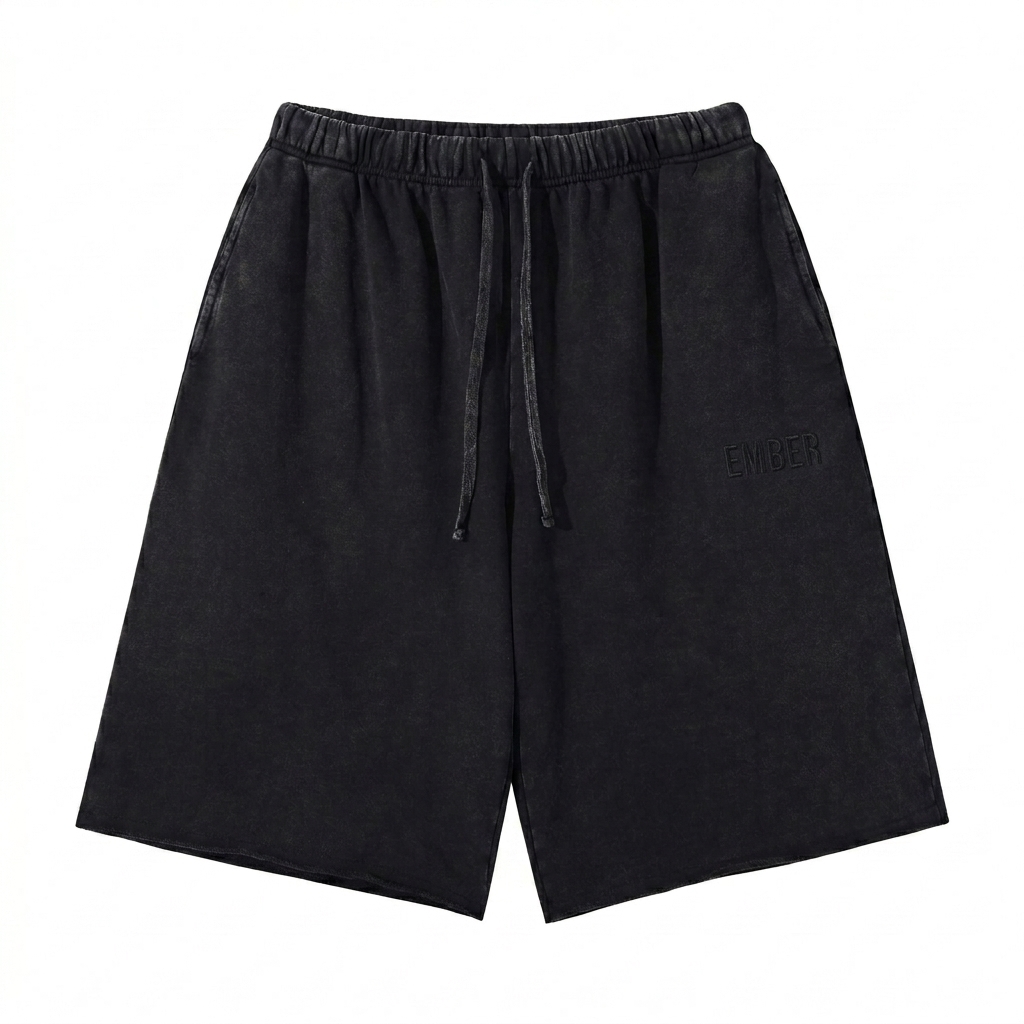 Custom Snow Washed Raw Hem Shorts design direction 1: Tonal Minimalist Wordmark featuring the EMBER wordmark