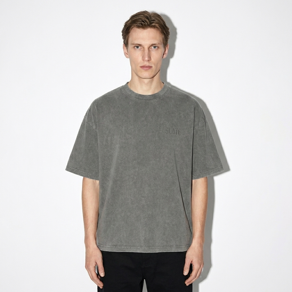 Snow Washed Striped Boxy T-Shirt worn by a slim tall Scandinavian male fashion influencer, gorpcore outdoor styling, studio lookbook — custom snow washed striped boxy t-shirt