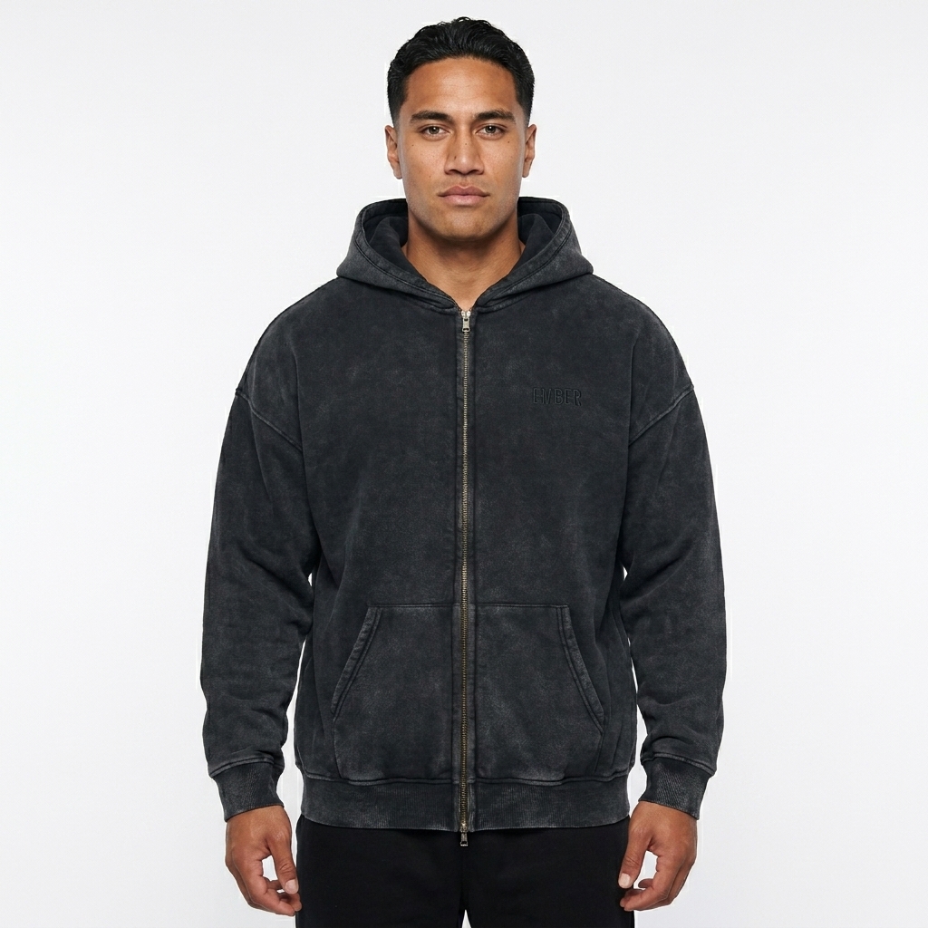 Snow Washed Zip-Through Hoodie worn by a athletic muscular Māori male fashion influencer, minimalist luxury styling, studio lookbook — custom snow washed zip-through hoodie