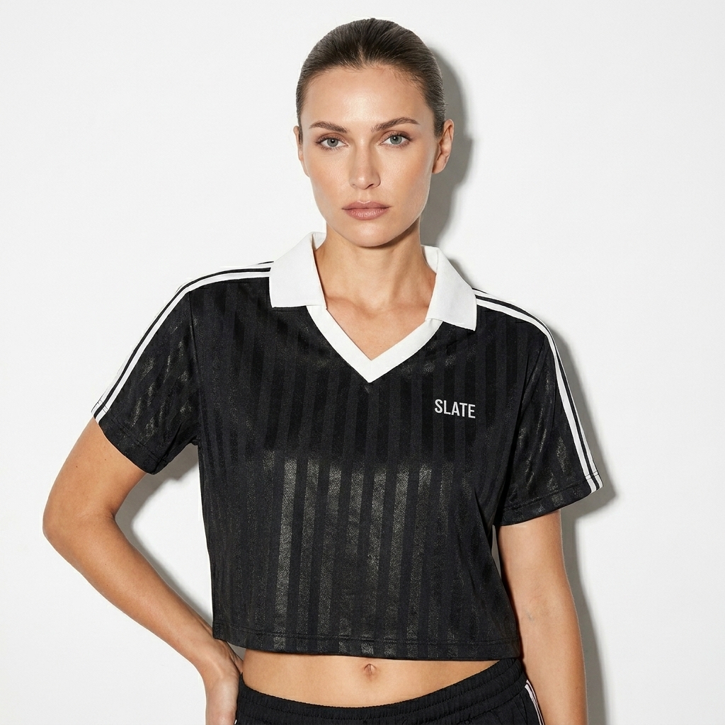 Striped Contrast Collar Cropped Jersey worn by a toned White European female fashion influencer, minimalist luxury styling, studio lookbook — custom striped contrast collar cropped jersey