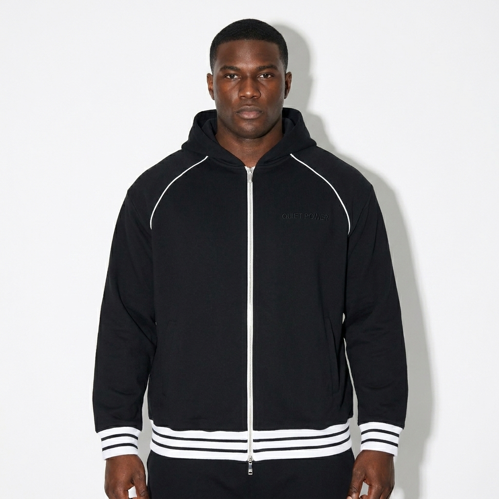 Striped Trim Zip-Up Hoodie worn by a broad-shouldered West African male fashion influencer, preppy ivy styling, studio lookbook — custom striped trim zip-up hoodie