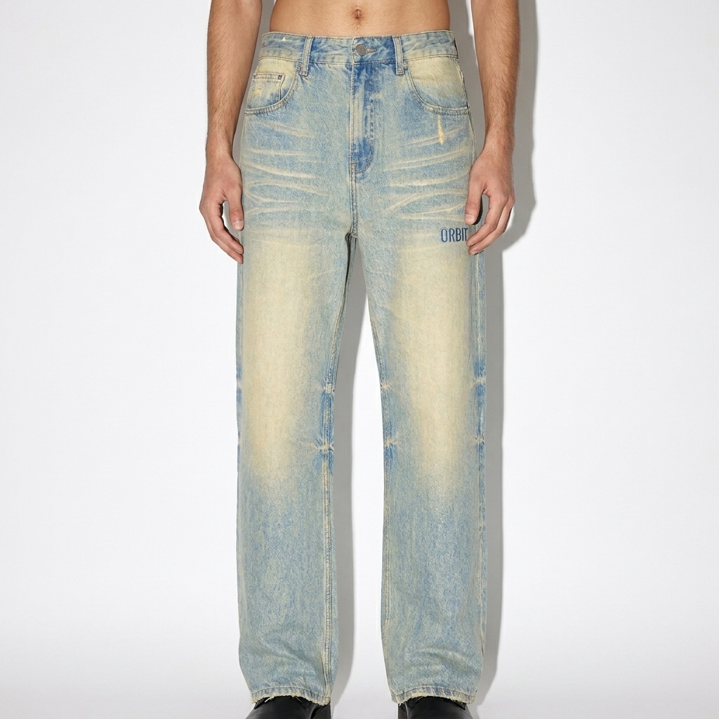 Sun Fade Raw Hem Denim Jeans worn by a slim tall Persian male fashion influencer, y2k revival styling, studio lookbook — custom sun fade raw hem denim jeans