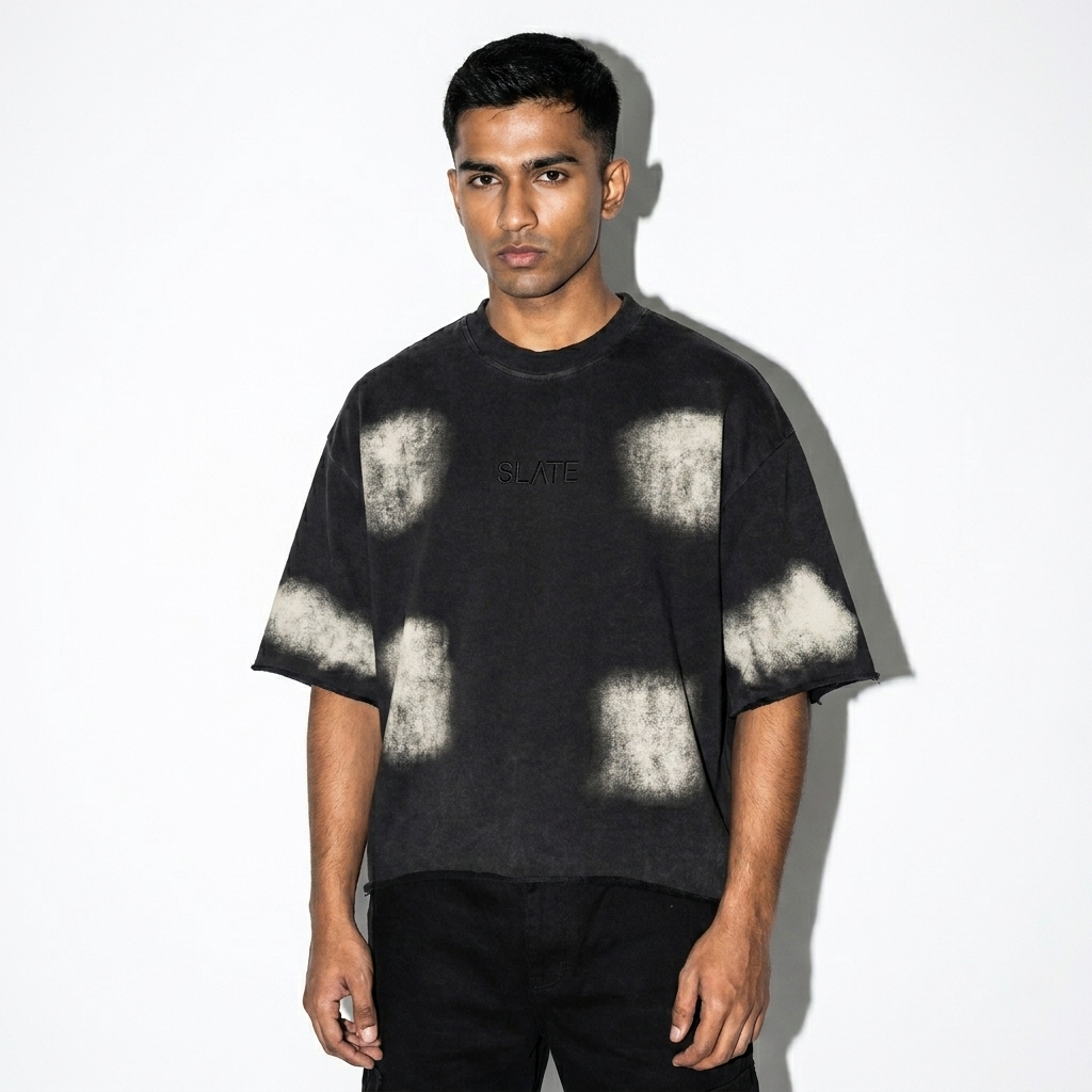Sunfade French Terry Raw Edge T-Shirt worn by a petite South Asian male fashion influencer, downtown streetwear styling, studio lookbook — custom sunfade french terry raw edge t-shirt
