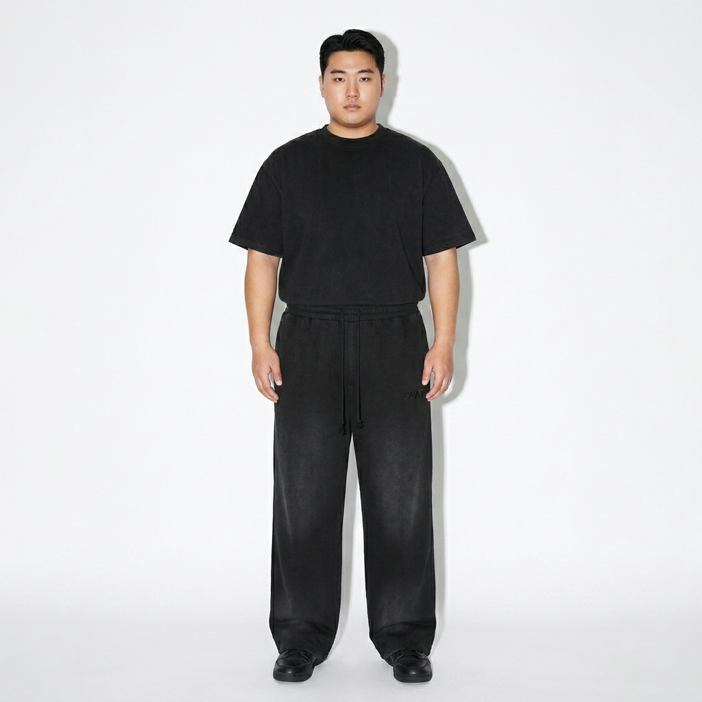 Sunfade Loose Fit Cotton Sweatpants worn by a curvy East Asian male fashion influencer, y2k revival styling, studio lookbook — custom sunfade loose fit cotton sweatpants