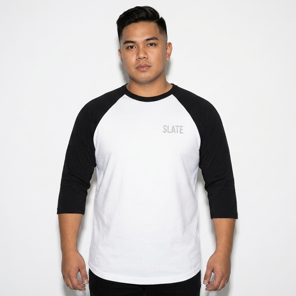 Unisex 3/4 Sleeve Raglan Shirt worn by a curvy Filipino male fashion influencer, techwear modern styling, studio lookbook — custom unisex 3/4 sleeve raglan shirt