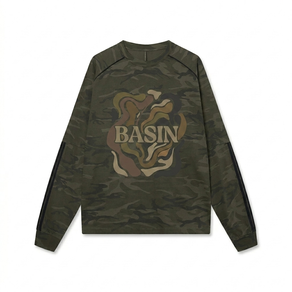 Custom Unisex Camo Long Sleeve T-Shirt design direction 2: Bold Graphic Illustration featuring the BASIN wordmark
