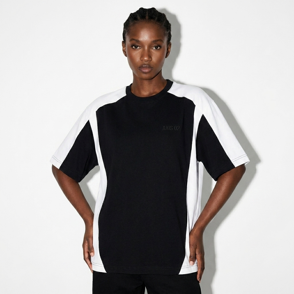 Unisex Color Block T-Shirt worn by a petite Black female fashion influencer, minimalist luxury styling, studio lookbook — custom unisex color block t-shirt