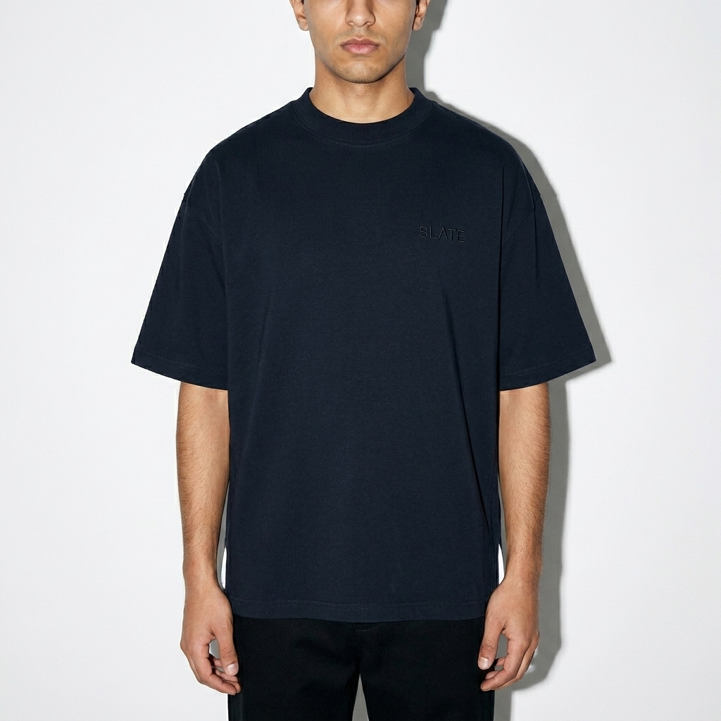 Unisex Colorblock Crewneck T-Shirt worn by a petite Arab male fashion influencer, editorial avant-garde styling, studio lookbook — custom unisex colorblock crewneck t-shirt