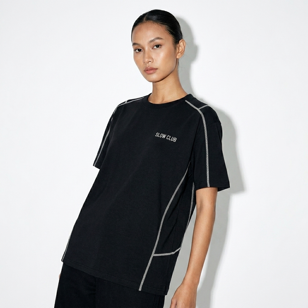 Unisex Contrast Stitch T-Shirt worn by a lean Southeast Asian female fashion influencer, preppy ivy styling, studio lookbook — custom unisex contrast stitch t-shirt