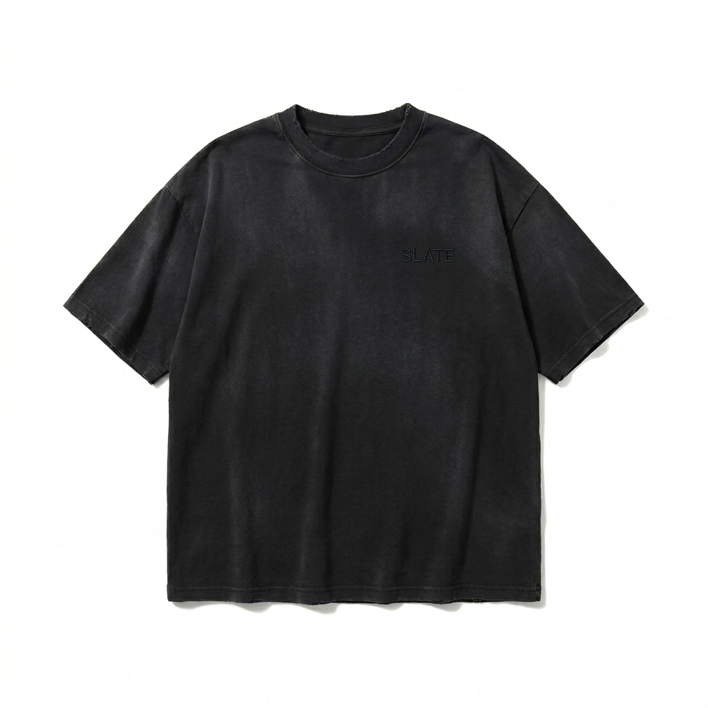 Custom Unisex Distressed Boxy T-Shirt design direction 1: Subtle Tonal Wordmark featuring the SLATE wordmark