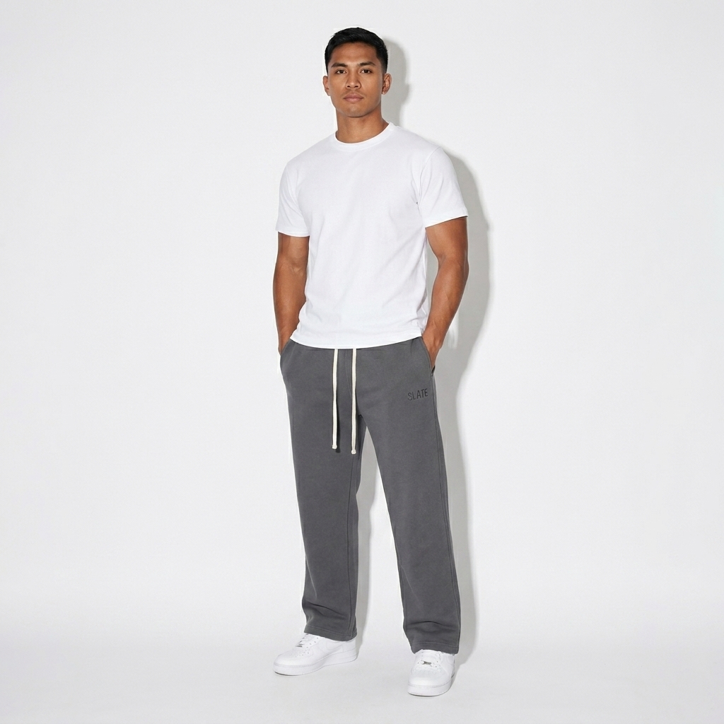 Unisex Fleece Straight Leg Pants worn by a athletic muscular Filipino male fashion influencer, gorpcore outdoor styling, studio lookbook — custom unisex fleece straight leg pants