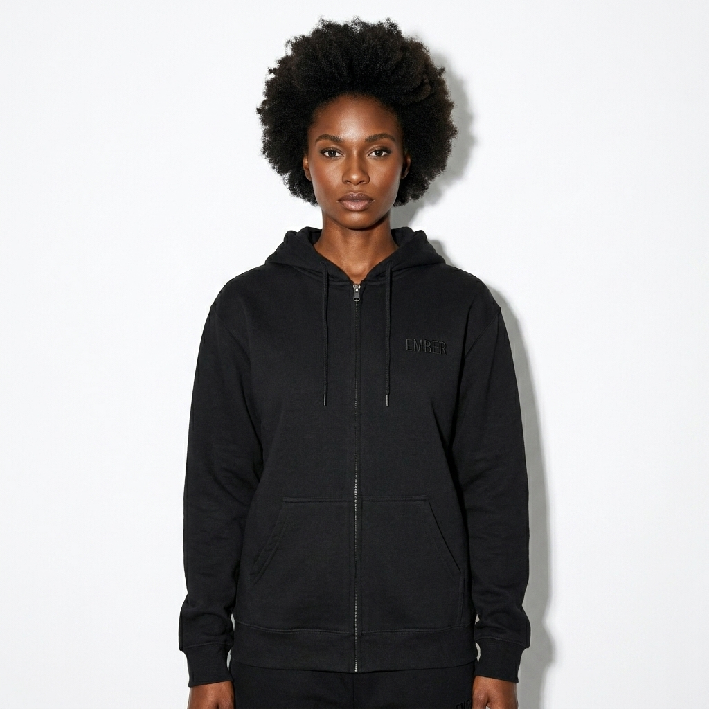 Unisex Fleece Zip Hoodie worn by a toned Black female fashion influencer, clean-girl minimal styling, studio lookbook — custom unisex fleece zip hoodie