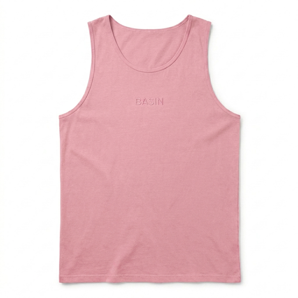 Custom Unisex Garment-Dyed Tank Top design direction 1: Tonal Minimalist Wordmark featuring the BASIN wordmark