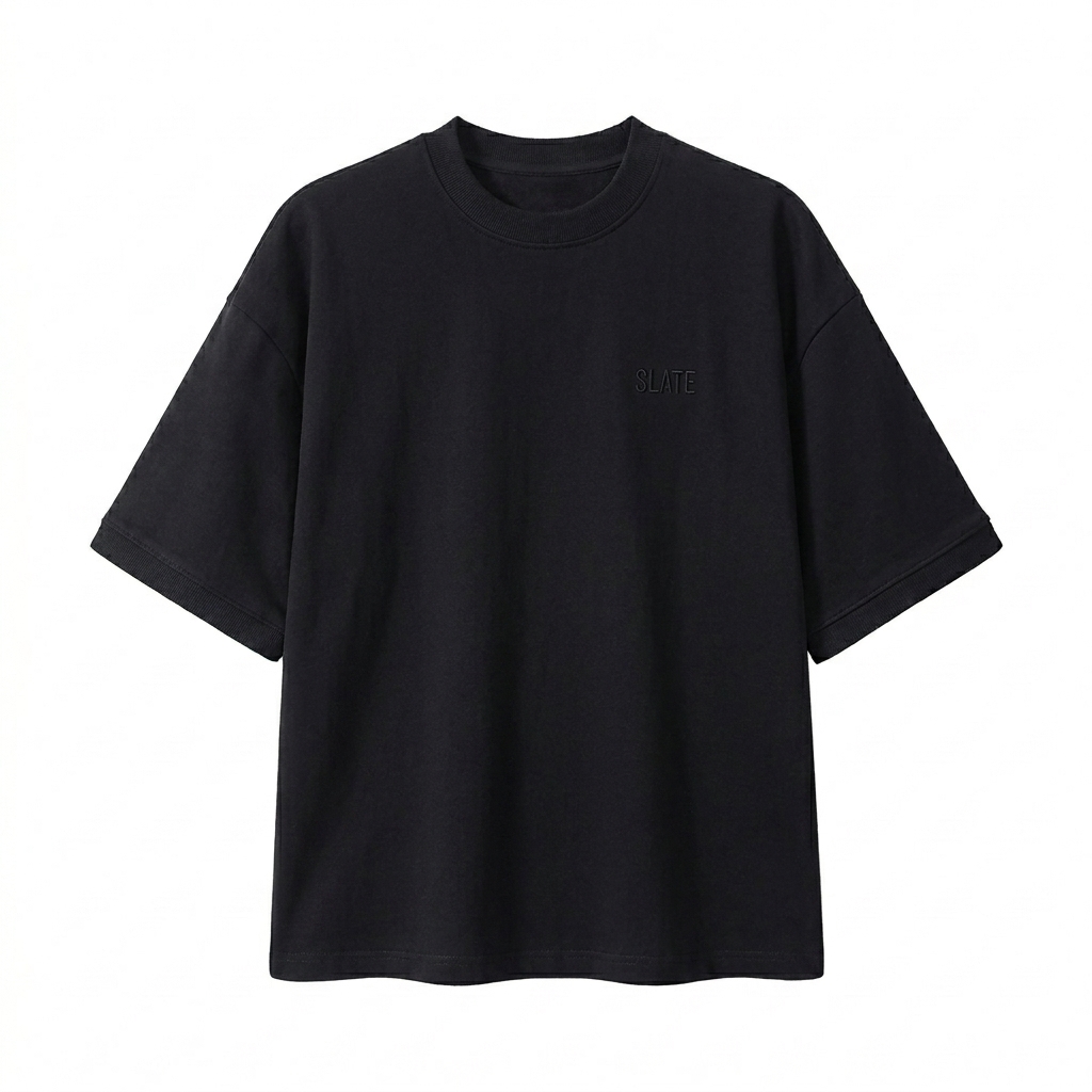 Custom Unisex Heavyweight Boxy T-Shirt design direction 1: Tonal Left Chest Branding featuring the SLATE wordmark