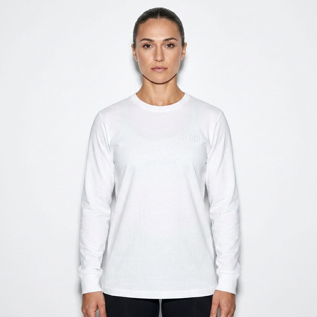 Unisex Long Sleeve Tee worn by a athletic muscular Eastern European female fashion influencer, preppy ivy styling, studio lookbook — custom unisex long sleeve tee
