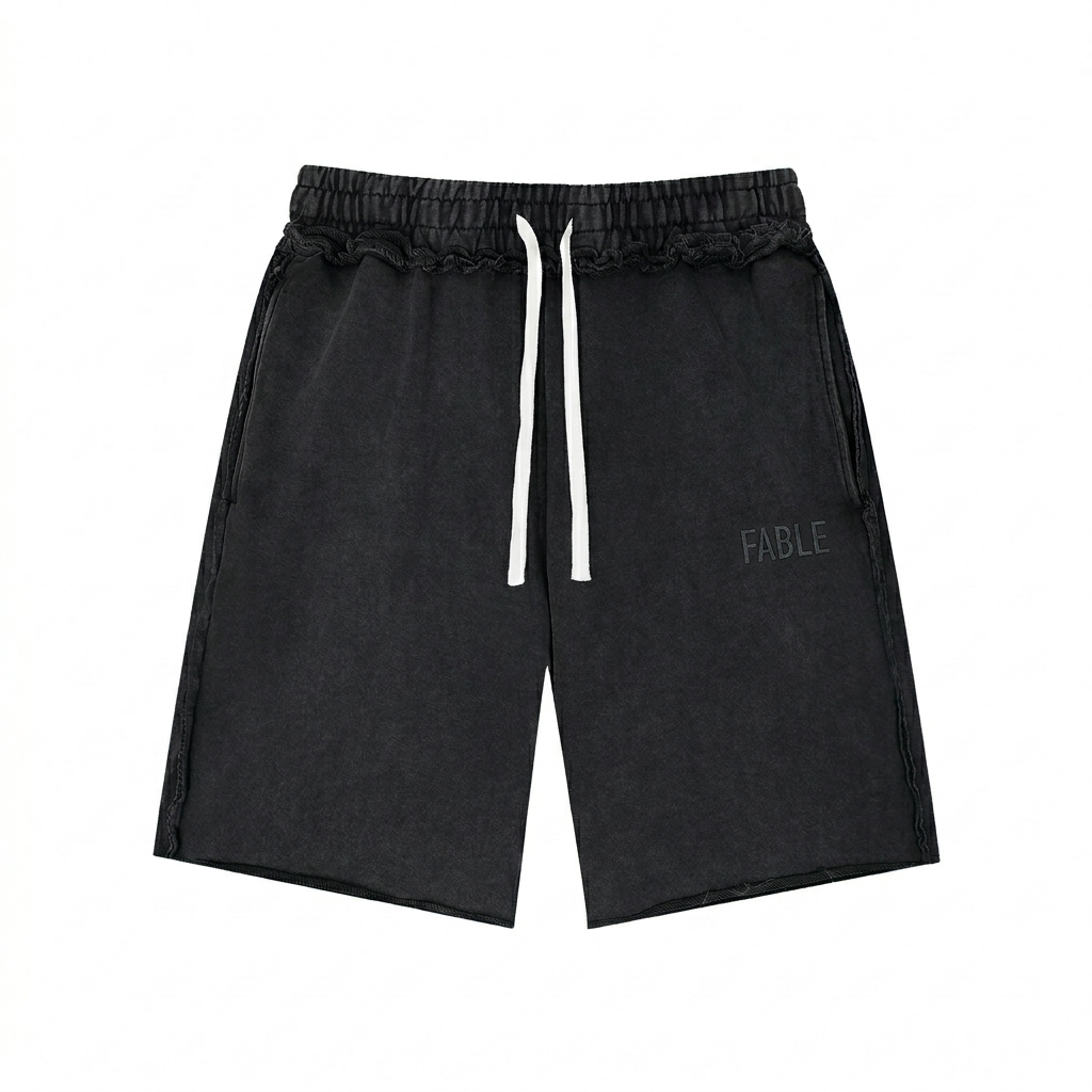 Custom Unisex Mineral Wash Raw Edge Shorts design direction 1: Tonal Minimalist Wordmark featuring the FABLE wordmark
