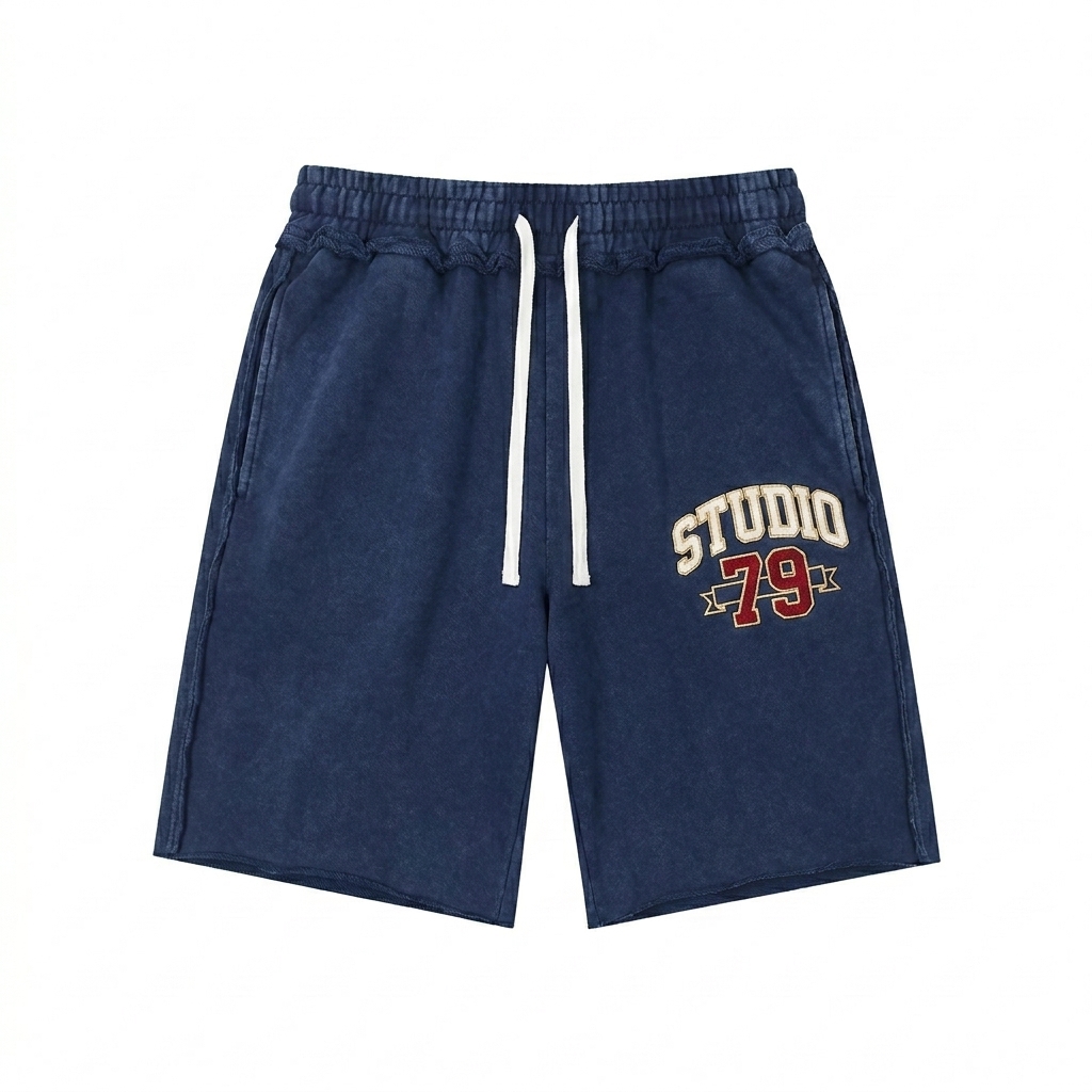 Custom Unisex Mineral Wash Raw Edge Shorts design direction 3: Retro Collegiate Emblem featuring the STUDIO 79 wordmark
