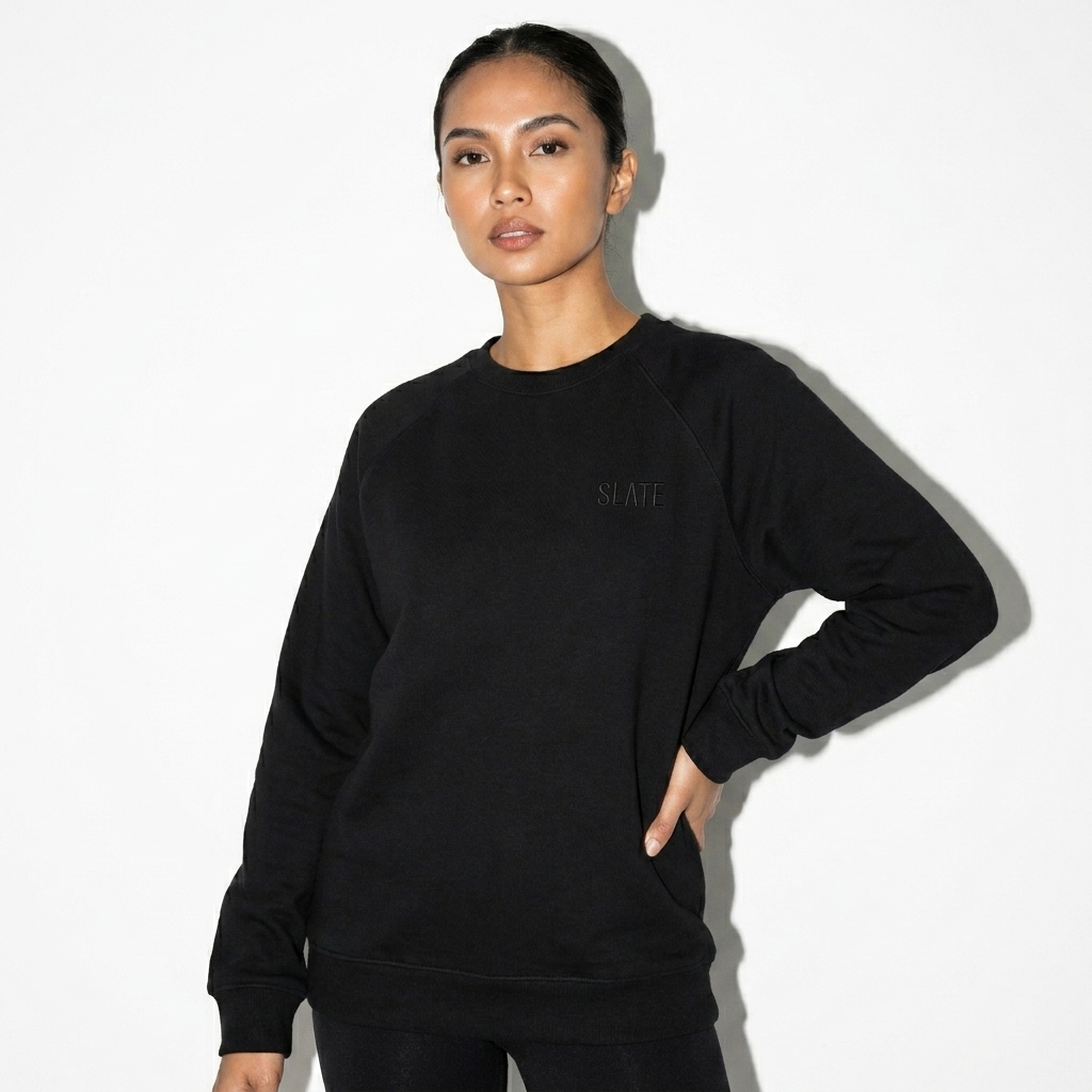 Unisex Organic Raglan Sweatshirt worn by a lean Filipino female fashion influencer, workwear utility styling, studio lookbook — custom unisex organic raglan sweatshirt