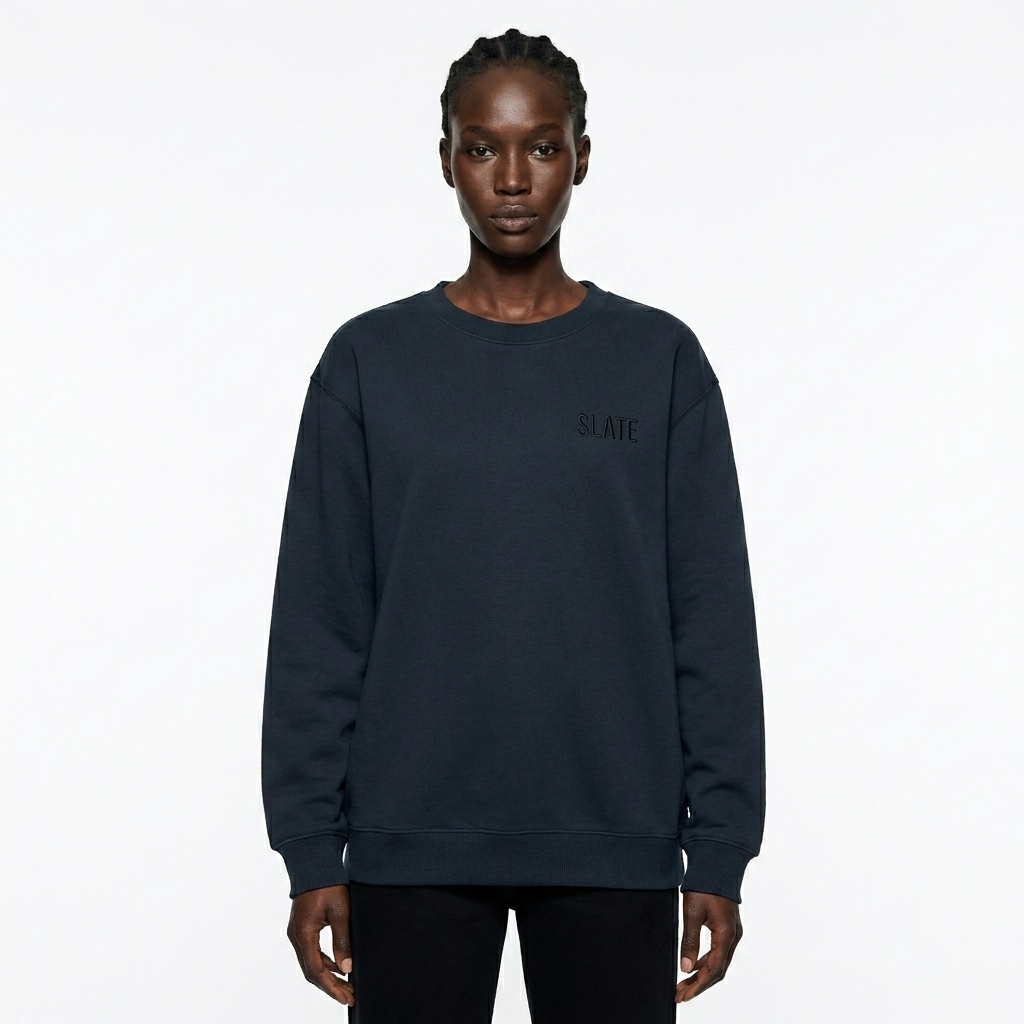 Unisex Oversized Crewneck Sweatshirt worn by a slim tall Black female fashion influencer, gorpcore outdoor styling, studio lookbook — custom unisex oversized crewneck sweatshirt