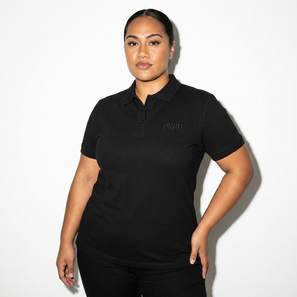 Unisex Pique Polo Shirt worn by a curvy Pacific Islander female fashion influencer, sporty athleisure styling, studio lookbook — custom unisex pique polo shirt
