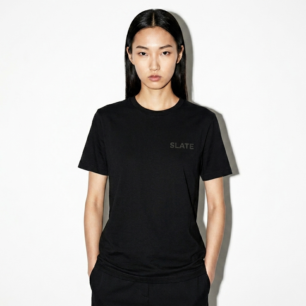 Unisex Recycled T-Shirt worn by a slim tall East Asian female fashion influencer, downtown streetwear styling, studio lookbook — custom unisex recycled t-shirt