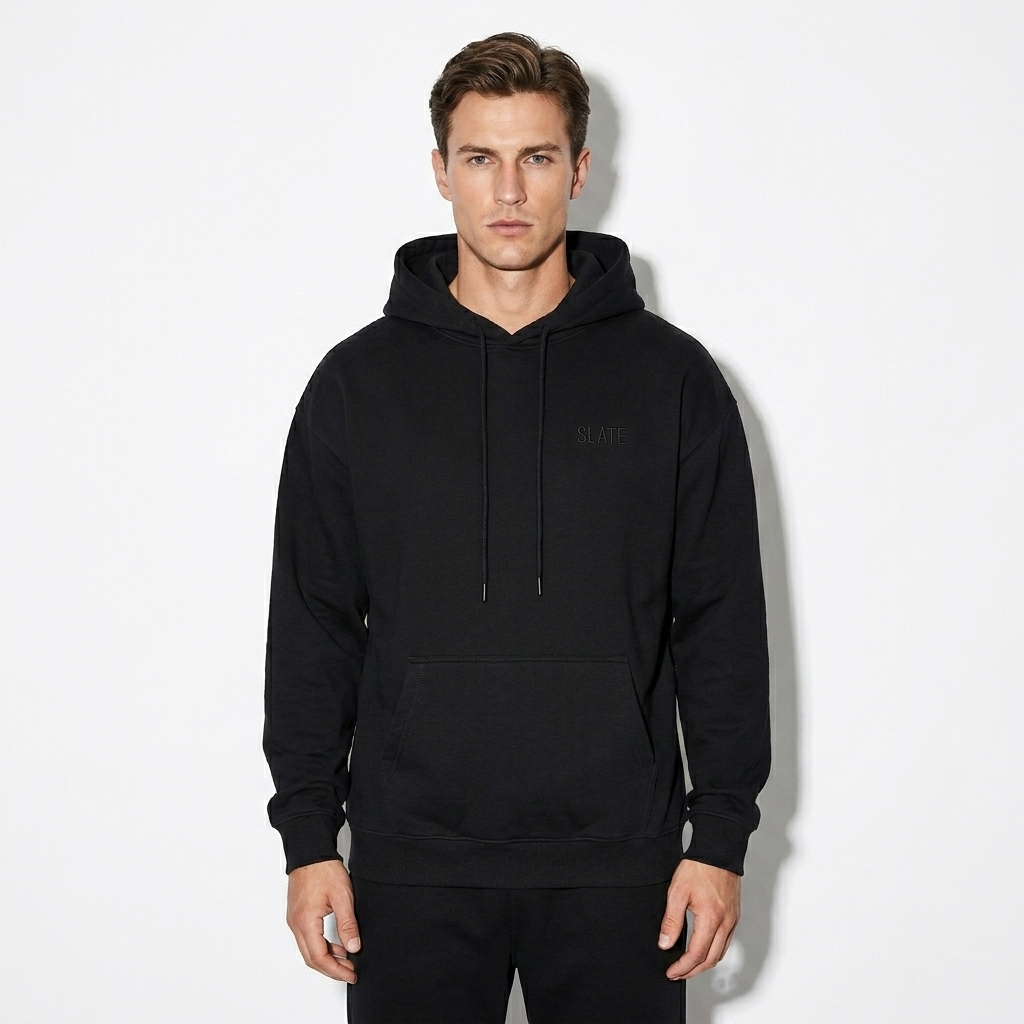 Unisex Relaxed Pullover Hoodie worn by a toned White European male fashion influencer, preppy ivy styling, studio lookbook — custom unisex relaxed pullover hoodie