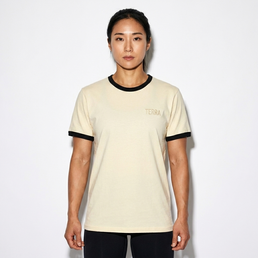 Unisex Ringer T-Shirt worn by a athletic muscular Korean female fashion influencer, clean-girl minimal styling, studio lookbook — custom unisex ringer t-shirt
