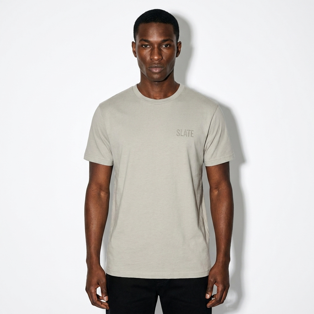 Unisex Soft Blend T-Shirt worn by a lean Afro-Caribbean male fashion influencer, techwear modern styling, studio lookbook — custom unisex soft blend t-shirt