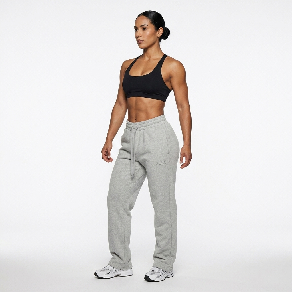 Unisex Straight Leg Pants worn by a athletic muscular Hispanic female fashion influencer, clean-girl minimal styling, studio lookbook — custom unisex straight leg pants