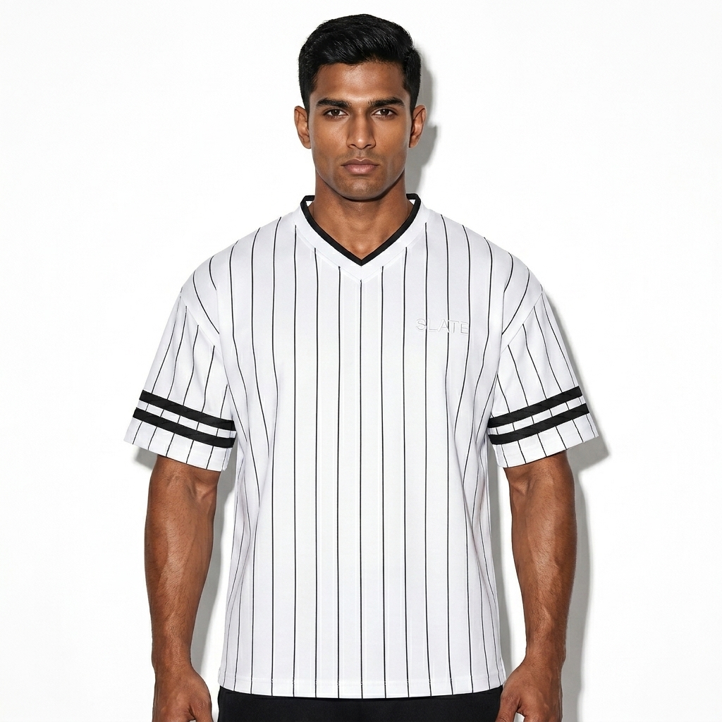 Unisex Striped V-Neck T-Shirt worn by a athletic muscular Indian male fashion influencer, gorpcore outdoor styling, studio lookbook — custom unisex striped v-neck t-shirt
