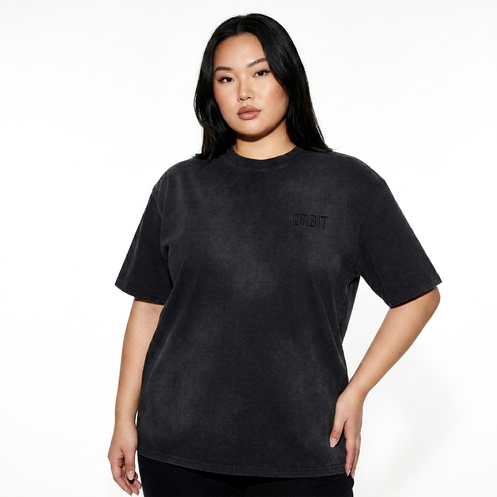 Unisex Sunfaded T-Shirt worn by a curvy East Asian female fashion influencer, downtown streetwear styling, studio lookbook — custom unisex sunfaded t-shirt