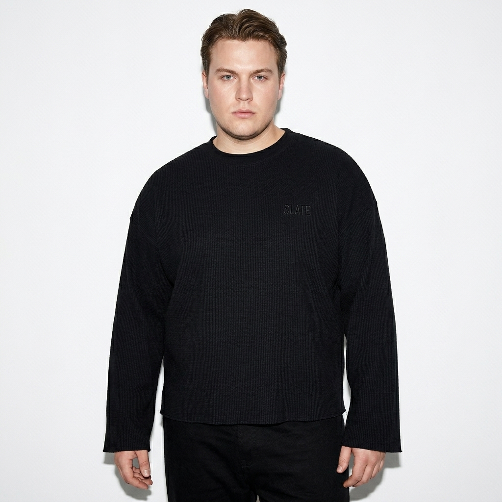 Unisex Waffle Raw Edge Long Sleeve T-Shirt worn by a curvy Scandinavian male fashion influencer, downtown streetwear styling, studio lookbook — custom unisex waffle raw edge long sleeve t-shirt