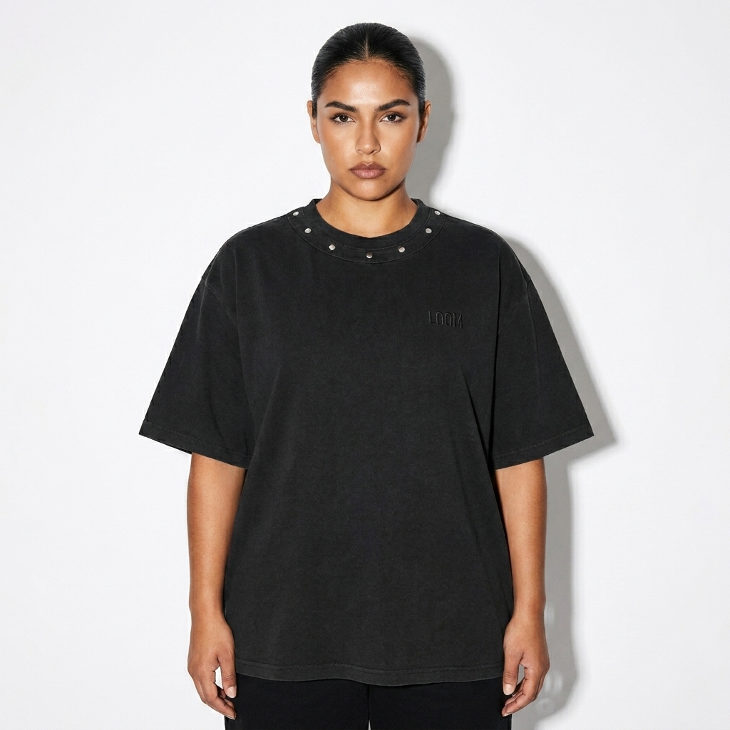 Unisex Washed Boxy Studded T-Shirt worn by a broad-shouldered Hispanic female fashion influencer, sporty athleisure styling, studio lookbook — custom unisex washed boxy studded t-shirt