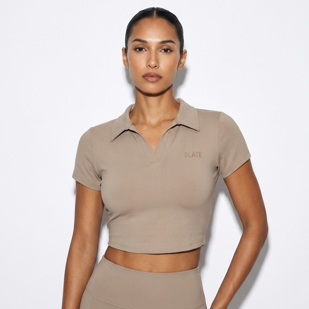 V-Neck Lapel Crop Top worn by a lean Hispanic female fashion influencer, clean-girl minimal styling, studio lookbook — custom v-neck lapel crop top