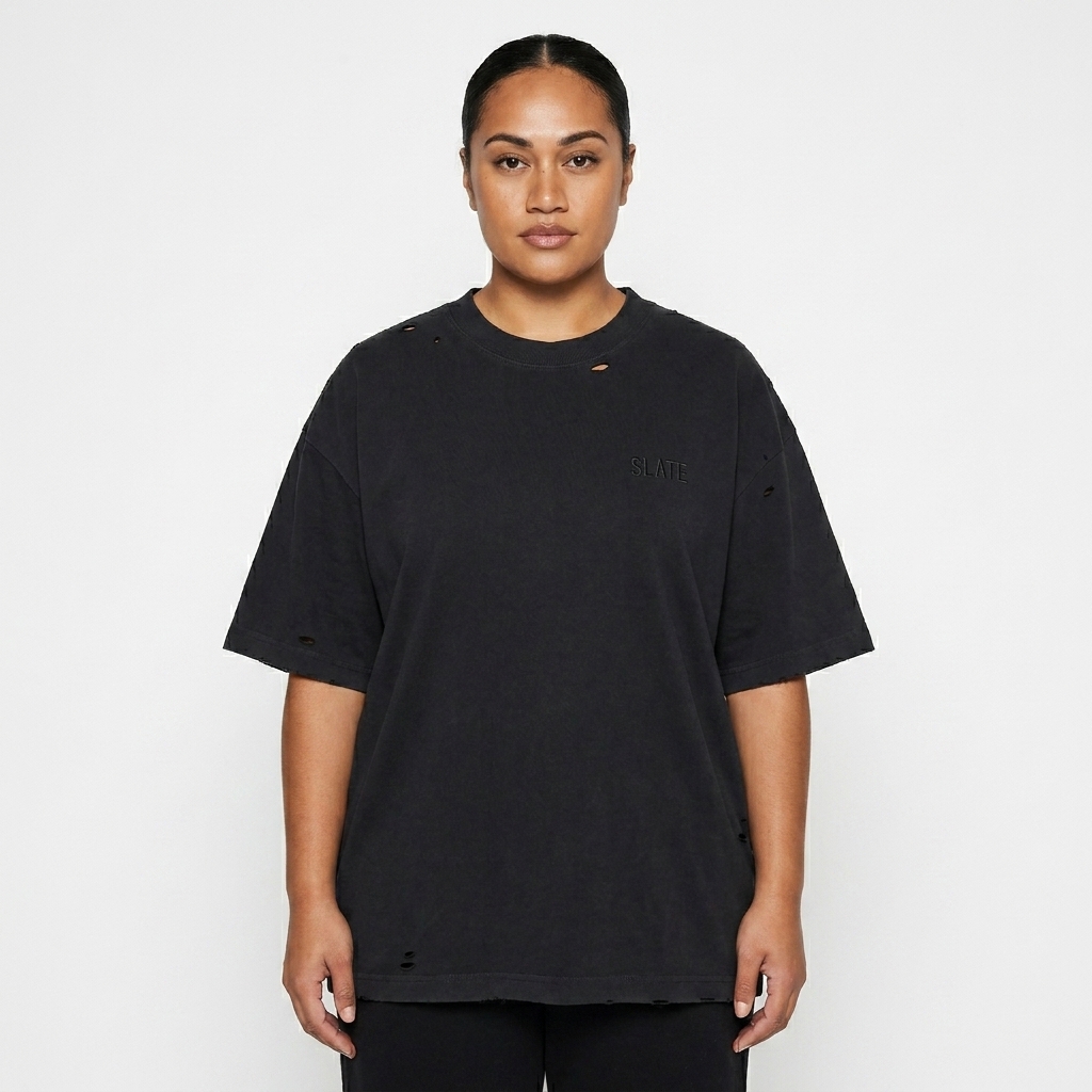 Vintage Washed Distressed Boxy Oversized T-Shirt worn by a mid-size Pacific Islander female fashion influencer, editorial avant-garde styling, studio lookbook — custom vintage washed distressed boxy oversized t-shirt