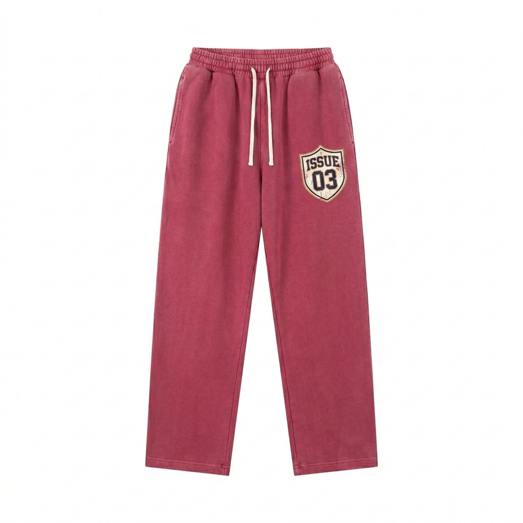 Custom Vintage Washed Drawstring Sweatpants design direction 3: Retro Collegiate Emblem featuring the ISSUE 03 wordmark