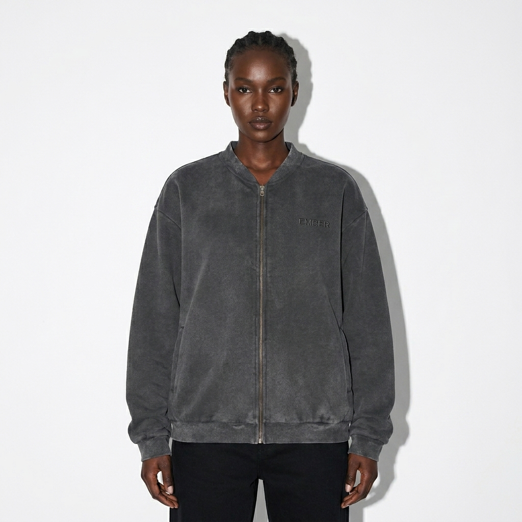 Vintage Washed Fleece Baseball Jacket worn by a broad-shouldered East African female fashion influencer, minimalist luxury styling, studio lookbook — custom vintage washed fleece baseball jacket