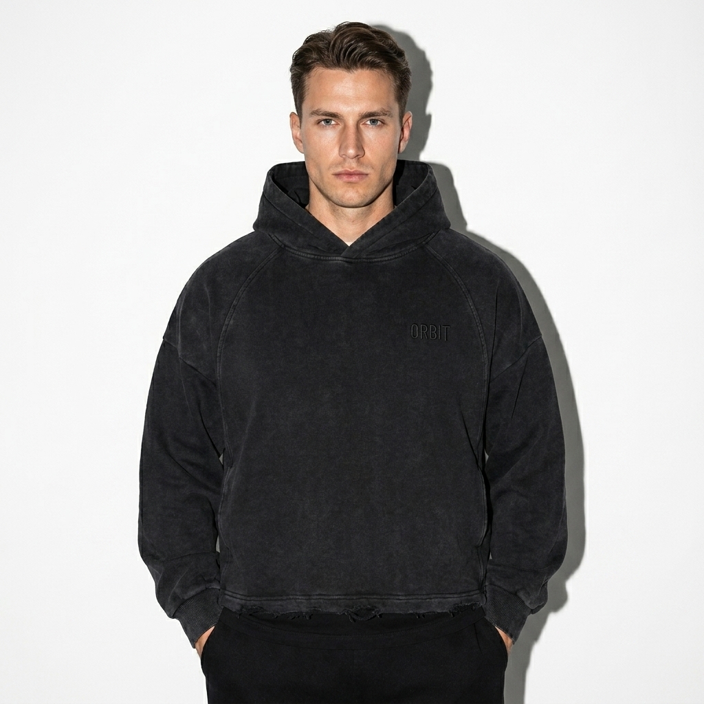 Vintage Washed Frayed-Hem Hoodie worn by a mid-size German male fashion influencer, preppy ivy styling, studio lookbook — custom vintage washed frayed-hem hoodie