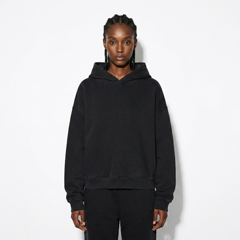 Vintage Washed Heavyweight Hoodie worn by a slim tall West African female fashion influencer, techwear modern styling, studio lookbook — custom vintage washed heavyweight hoodie